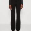 Claire Pintuck Flared Pants - Trousers - Jet Black