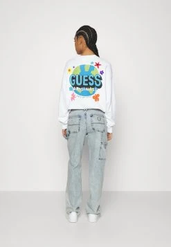 Sade Carpenter- Relaxed Fit Jeans - Light-Blue Denim -Guess Apparel 440a662aa37c46038cbe16ba96081579